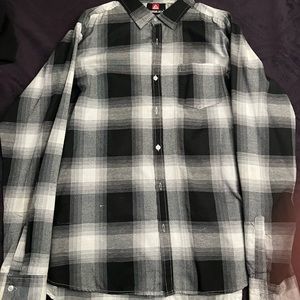 Black and white checkered flannel. (Slightly worn)